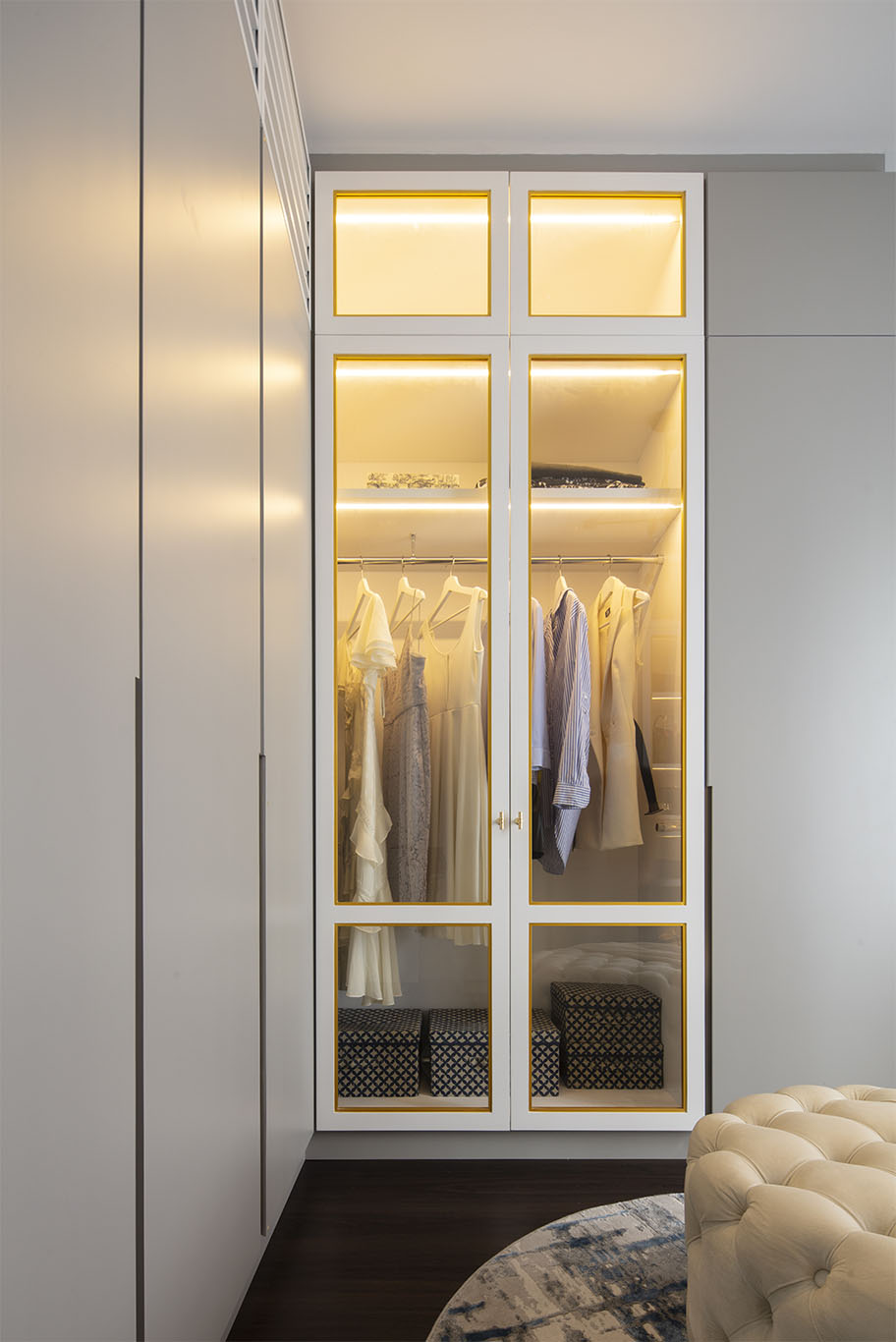 White wardrobe with glass transparent door walk in closet