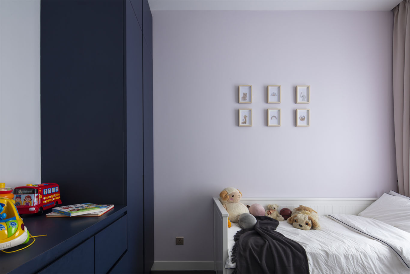 minimalist kids bedroom interior design with minimalist cute picture frame, bold blue color cupboard, and white bed