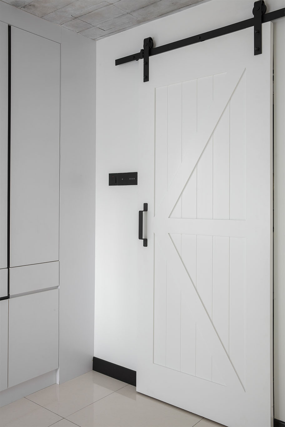 Modern minimalist sliding barn door with black handle
