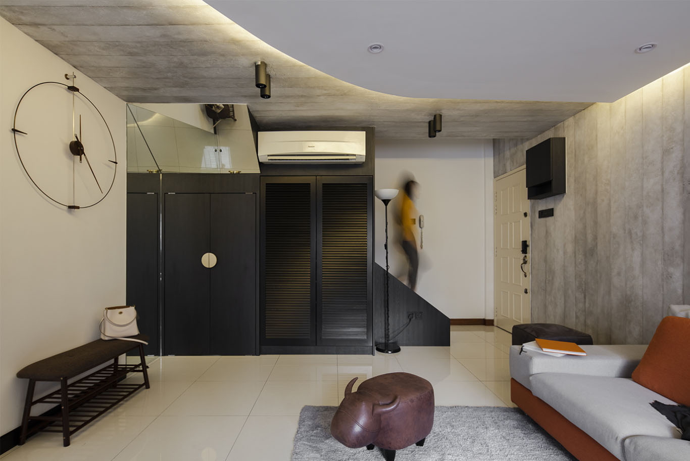 Modern rustic theme interior design with wooden rustic wall and ceiling, with black minimalist cupboard with gold handle, and a hint of orange color of furniture