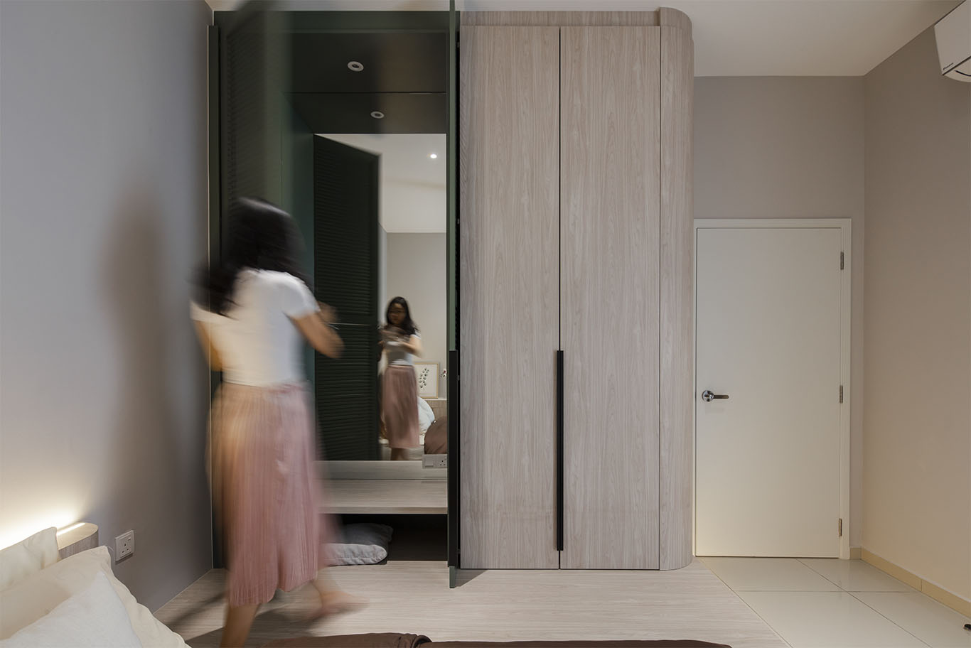 Grande Rhapsody minimalist bedroom with earth tone furniture Mieux interior design