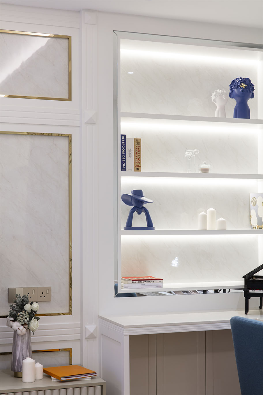 MIEUX The White Royale white marble shelf with mini blue statue structure mieux interior design