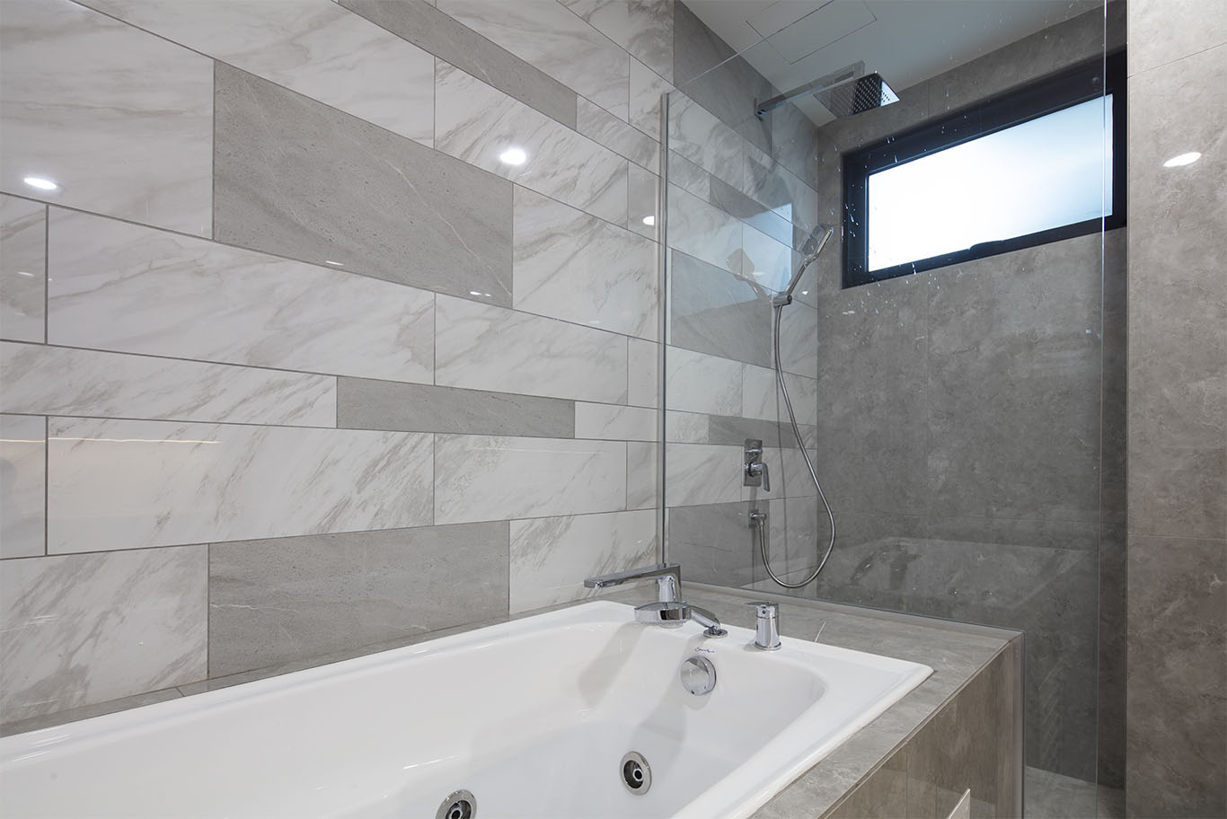 MIEUX The White Royale bathroom with white tub and grey marble tiles wall mieux interior design
