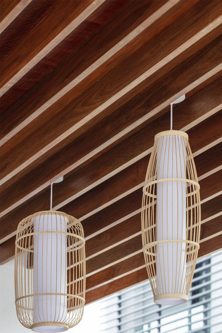 MIEUX The White Royale wooden strips outside ceiling with minimalist hanging lights mieux interior design