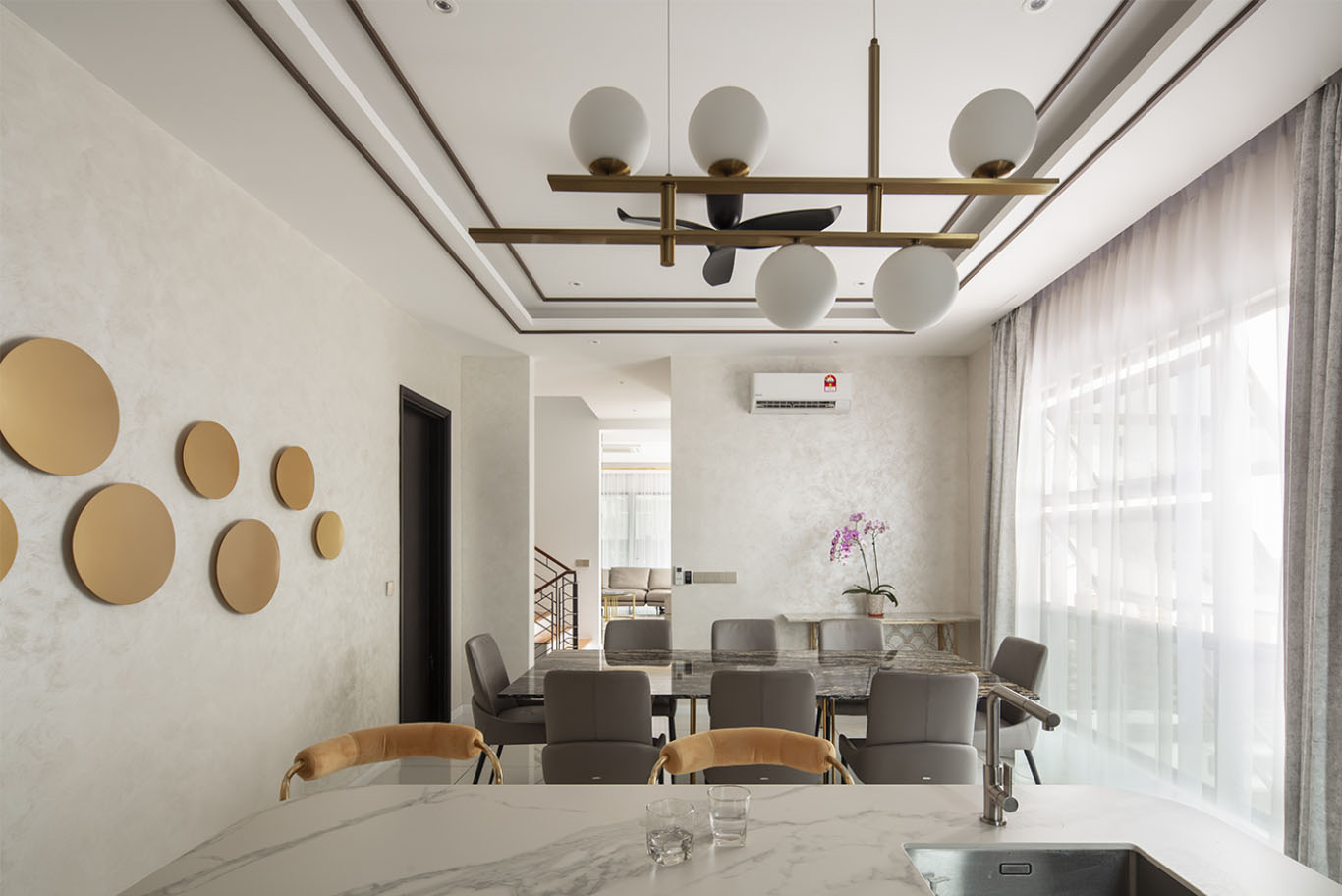 MIEUX La Famillie De Lee minimalist dining area beside luxury indoor mini bar mieux interior design