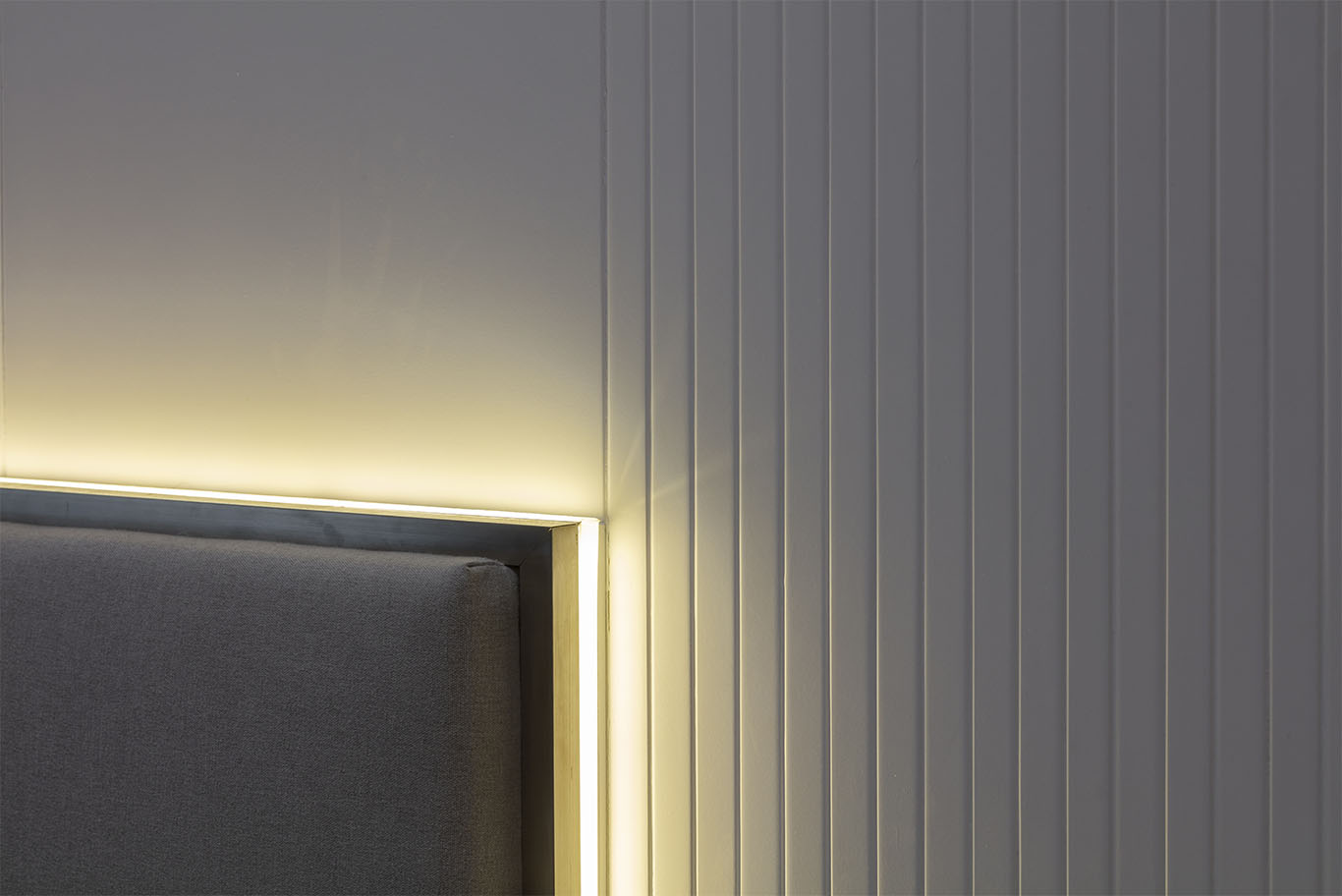 MIEUX La Famillie De Lee grey color bed frame with hidden light behind bed frame 3 mieux interior design