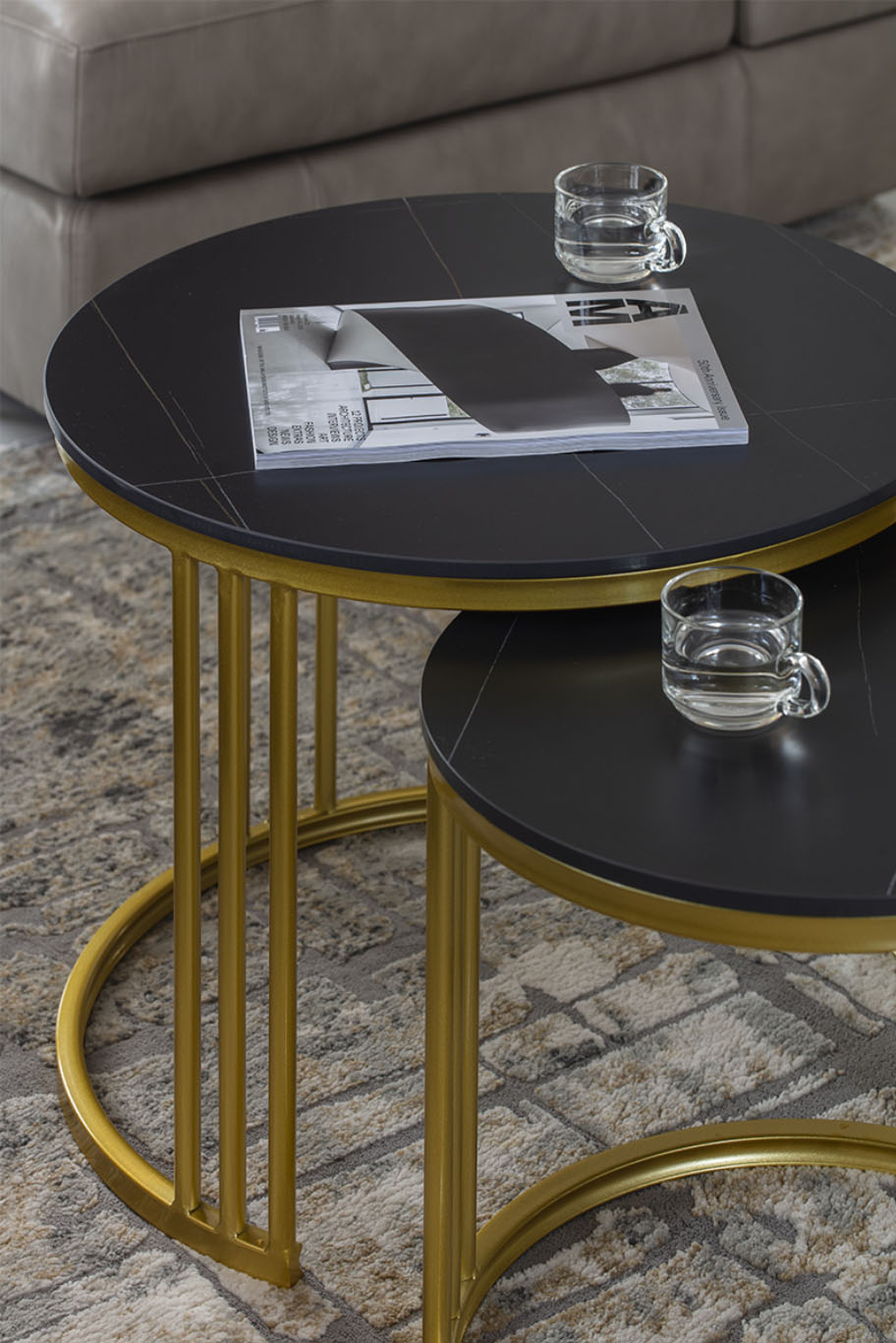 MIEUX La Famillie De Lee round black marble overlap mini coffee table with gold color stand mieux interior design