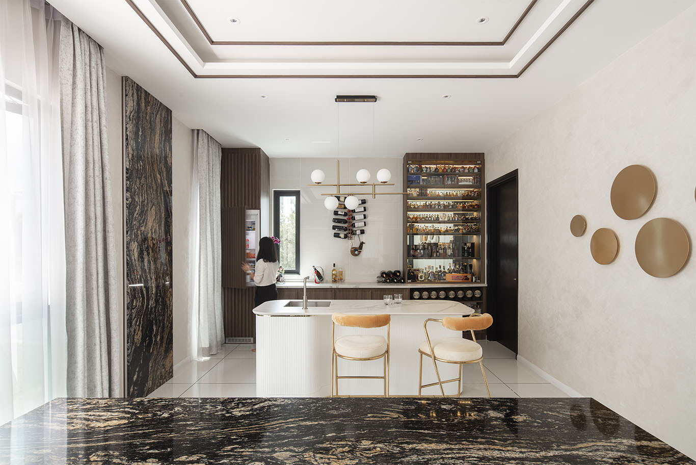 MIEUX La Famillie De Lee luxury mini bar design with black and gold marble mieux interior design