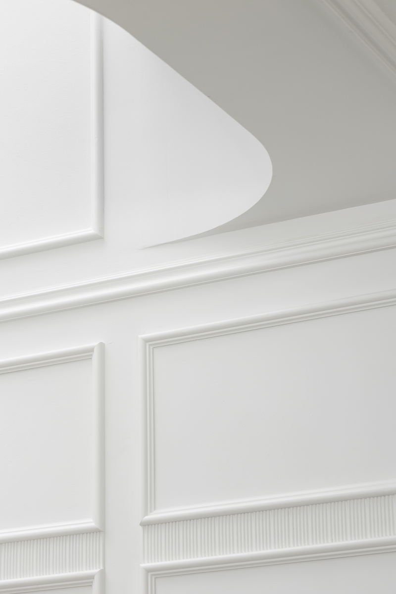 Classical Marriage white wall panels close up view mieux interior design