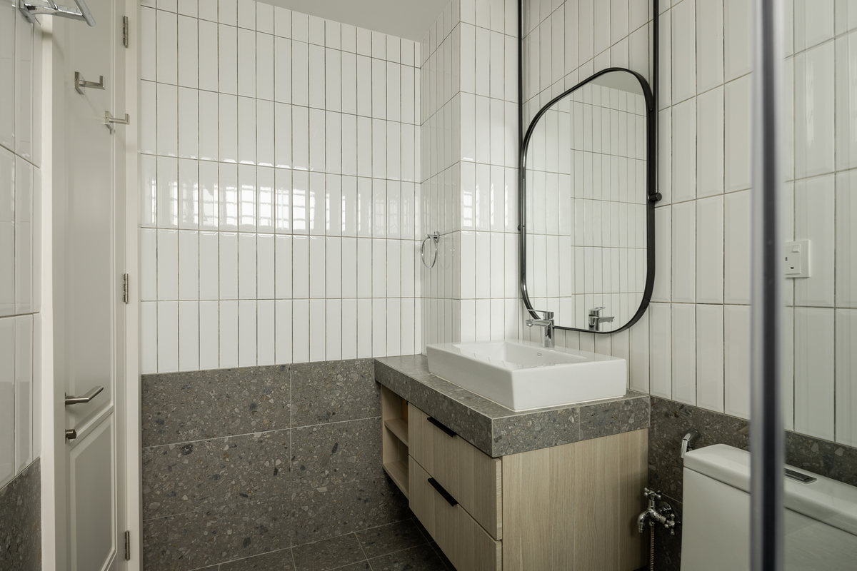 the eastern oriental aesthetic modern bathroom with rectangle wall tiles and semi oval mirror side view mieux interior design