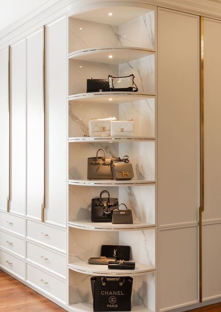Milady Fantasy modern luxury walk in closet with wooden floor and white furniture close up mieux interior design