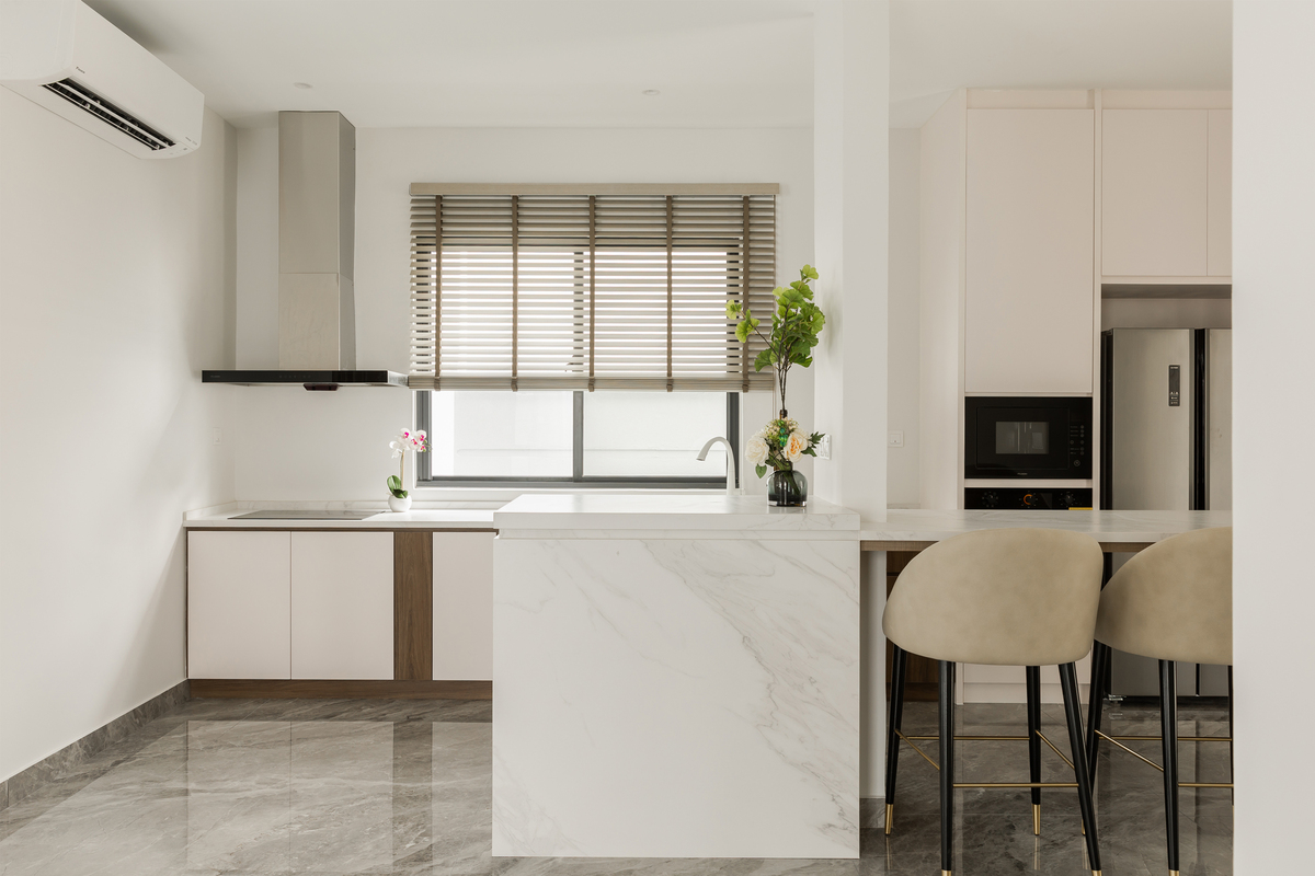 Modern kitchen design with marble and wood furniture