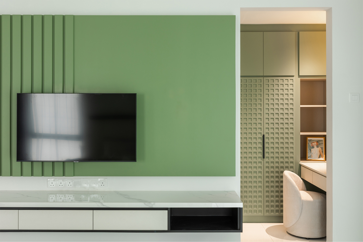 Modern bedroom interior design with hanging TV and cabinet and cupboard design that look like a waffle with soft green tone color