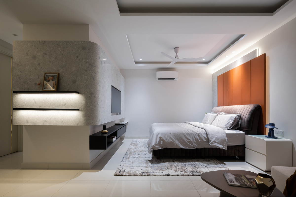 Modern bedroom design with marble wall, orange wall panels, and grey carpet