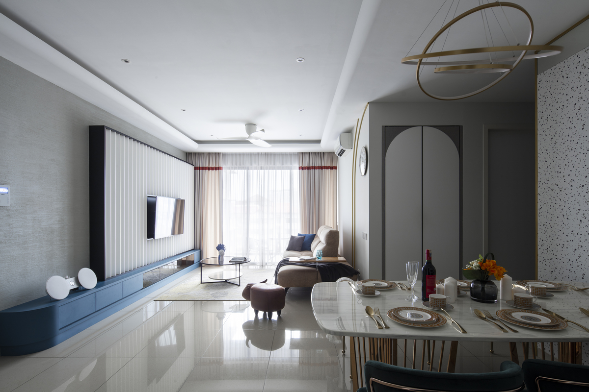 Modern condo interior design with grey, blue and gold color