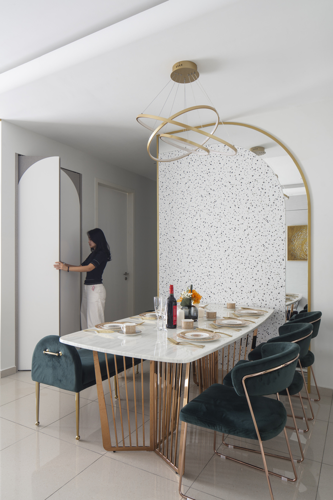 Condo dining area interior design with hidden cupboard