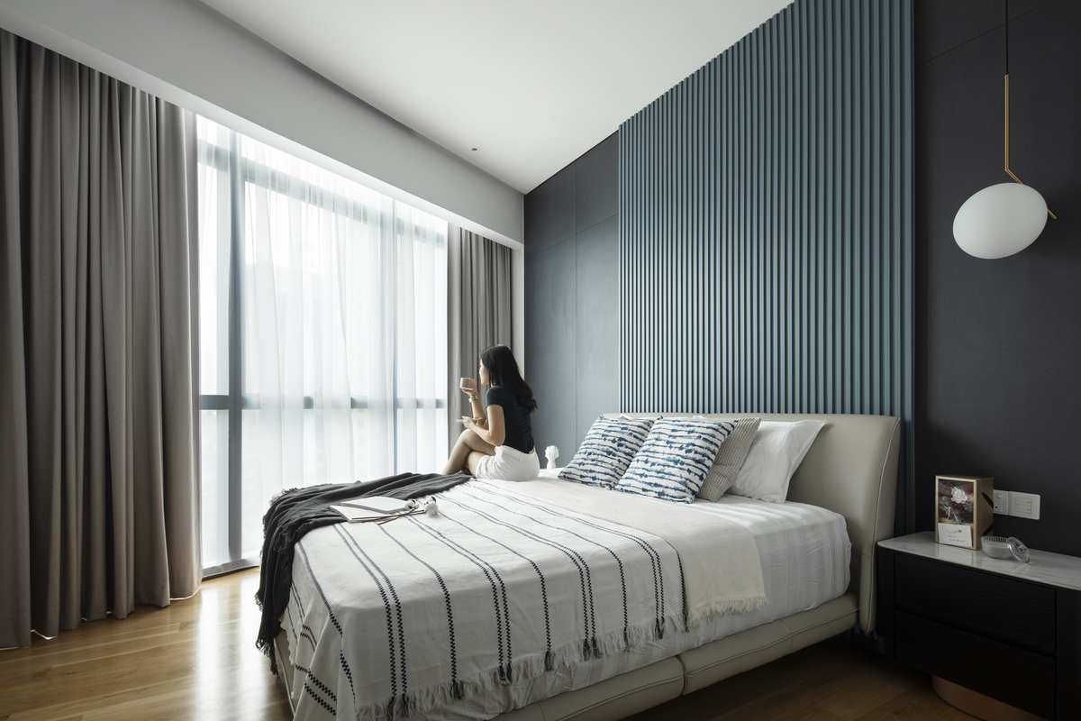 Modern contemporary bedroom with fluted wall panels